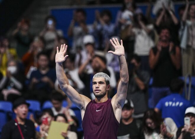 Carlos Alcaraz survives injury scare, rain delay to win Tokyo opener